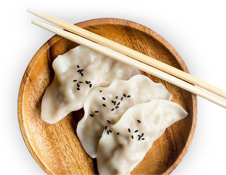 Three dumplings in a bow with two chopsticks